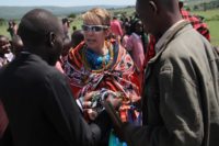 Christel at the Mara Rianta School and Sunflower Cafe. The village thanks us by draping Shuka's around each volunteer. We are part of the family.